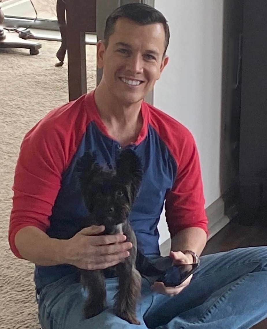 Michael Flynn at home with one of his Yorkies